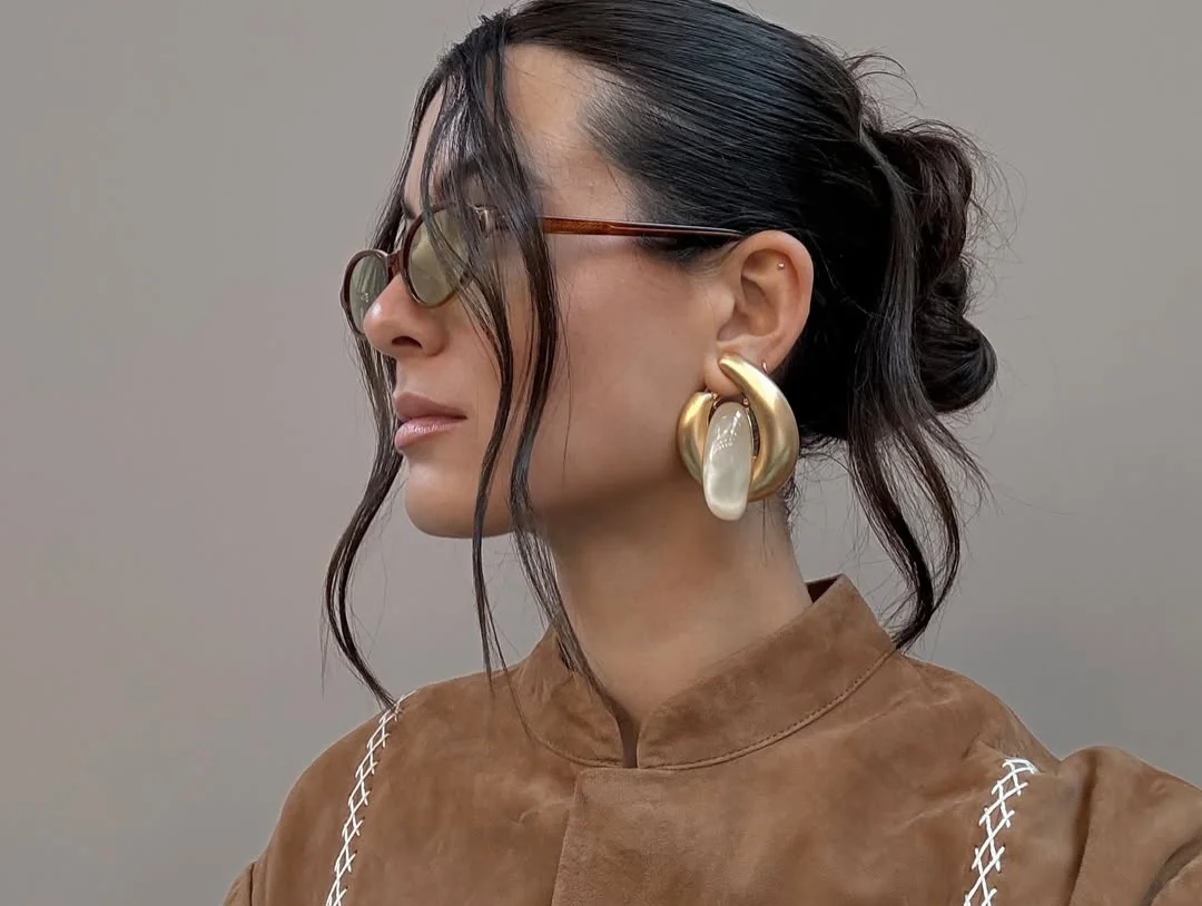 От гладкого и небрежного до «ракушки»: гид по стильным пучкам